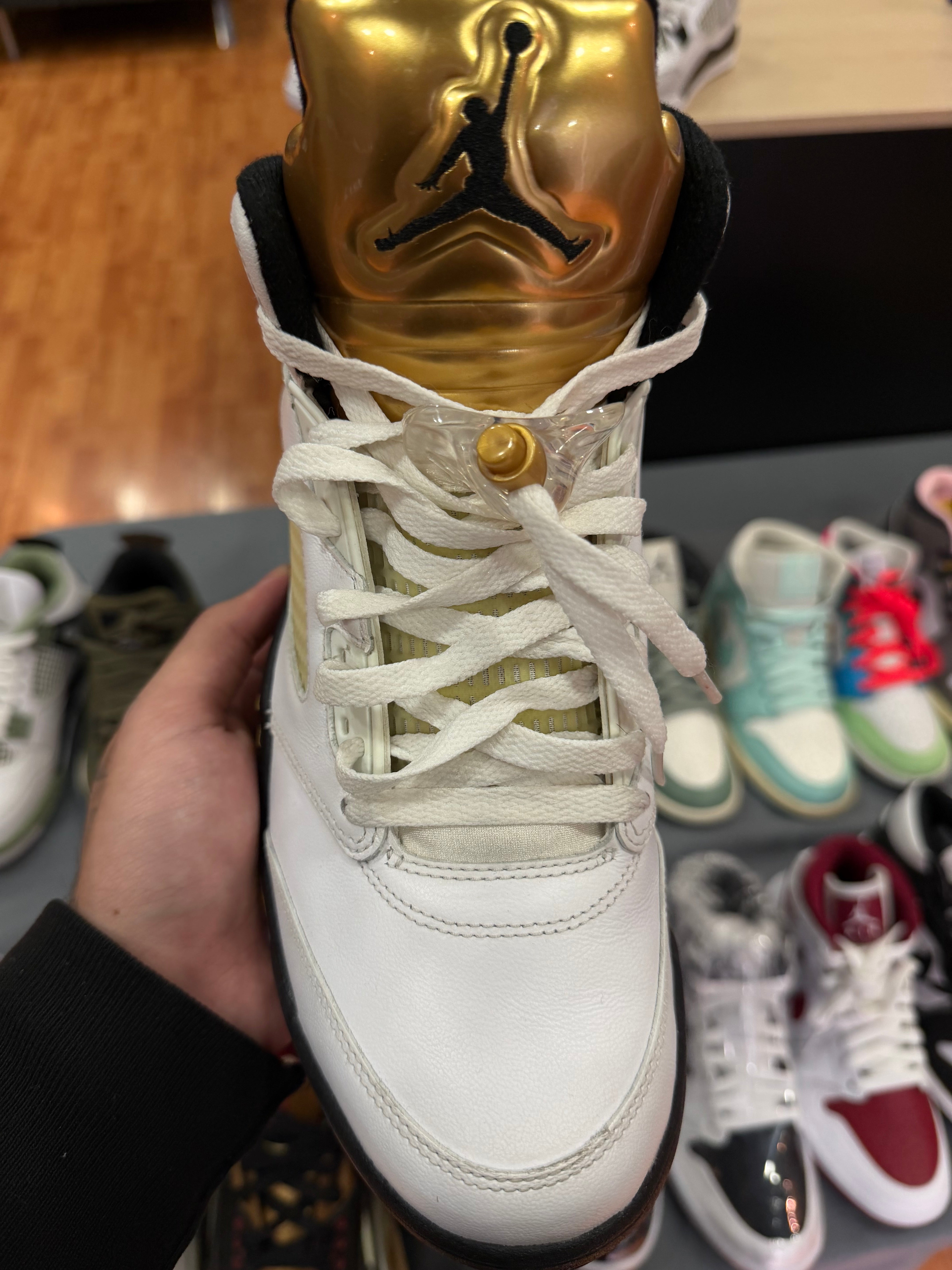 white and gold jordans 5